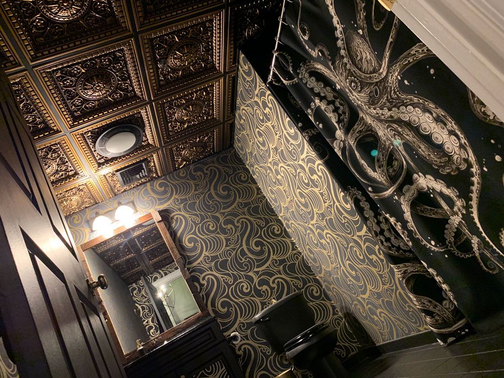 black and gold octopus bathroom