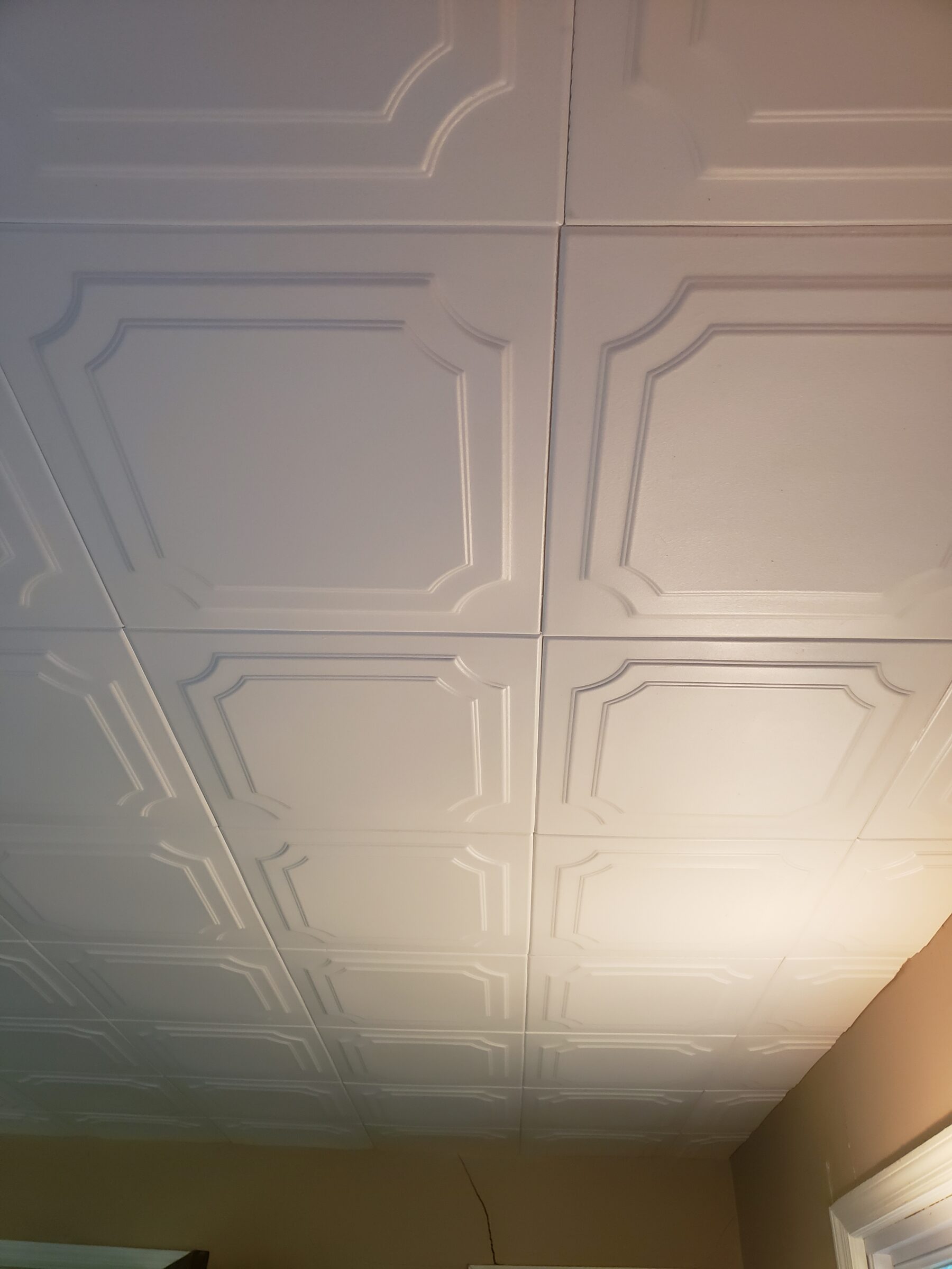 hiding cracks and peeling ceiling on 1942 plaster ceiling