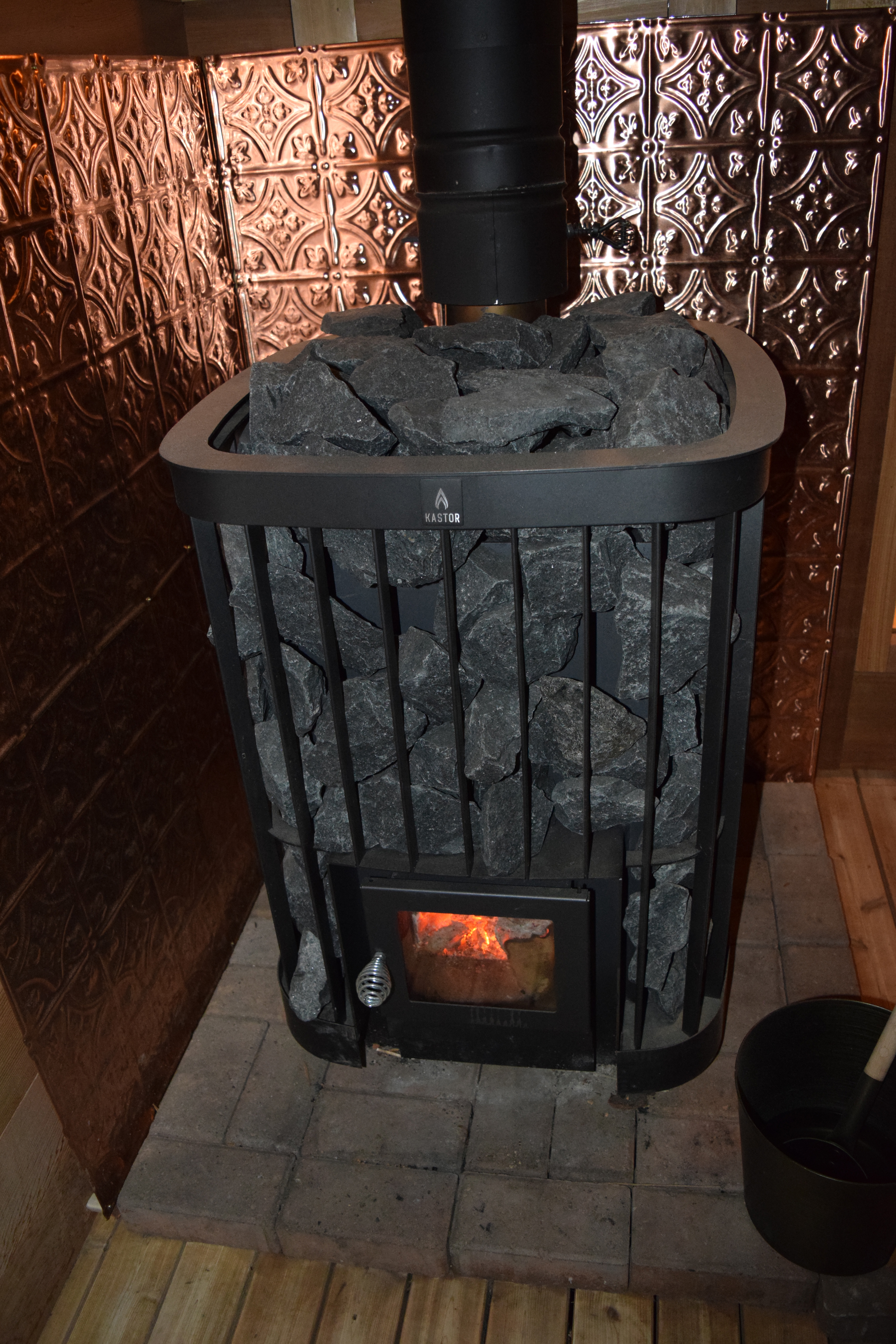Copper heat shield!!  Wood stove surround, Wood stove heat shield, Utility  room designs
