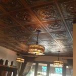 Argonaut – Faux Tin Ceiling Tile – 24 x 24 – #DCT01 - Aged Copper - Installed at "Blue Daisy Cafe"